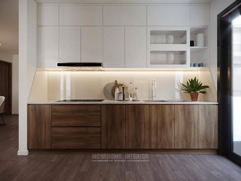 Tủ bếp dưới được làm từ gỗ công nghiệp màu nâu trầm sang trọng, có ngăn tủ cỡ lớn giúp cho việc cất, chứa đồ đạc của người nội trợ trở nên thuận tiện hơn.
